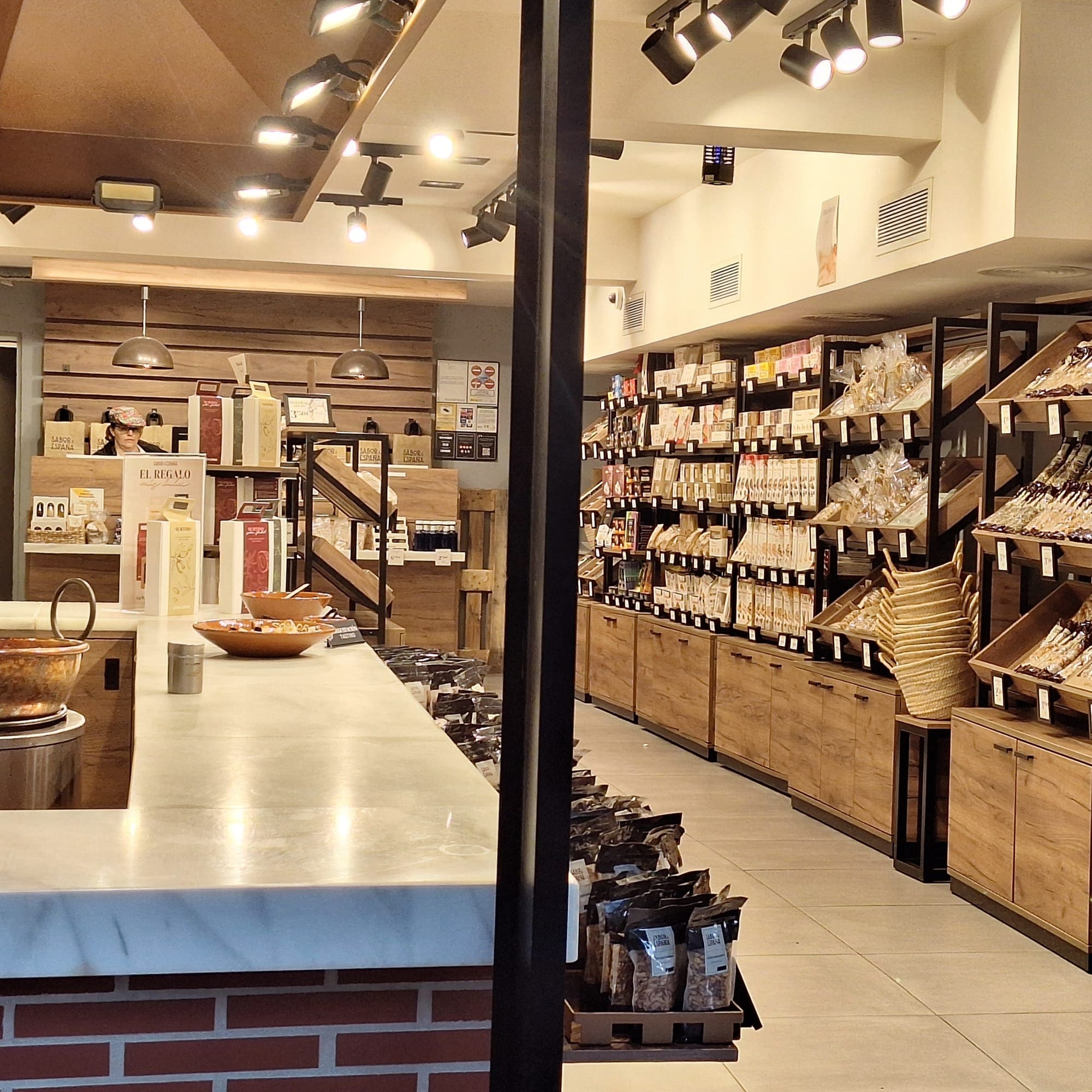 The service counter and shelving of a small shop.