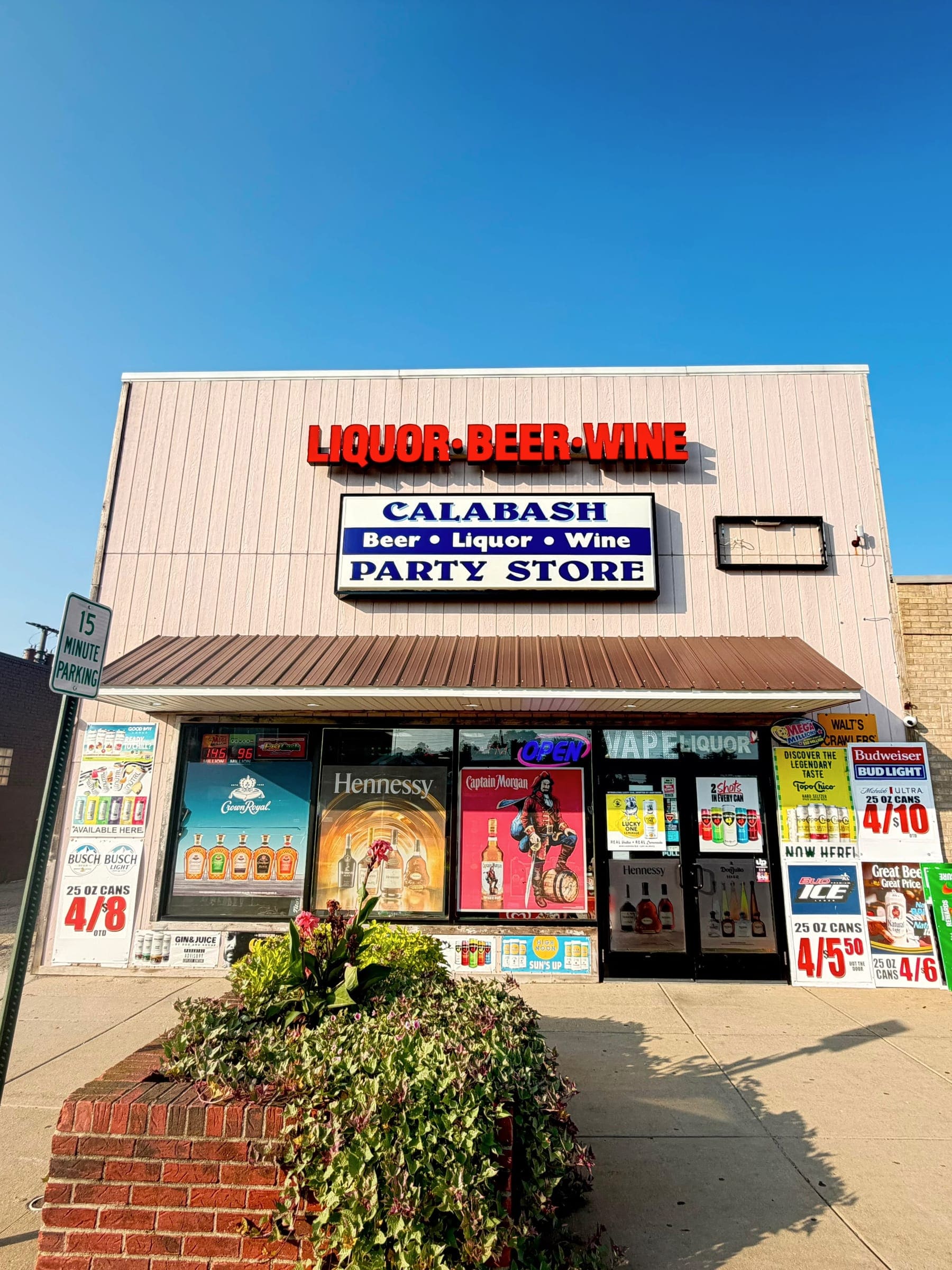Calabash Party Store seen from across the sidewalk on W Monroe Street.